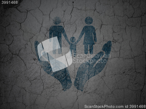 Image of Insurance concept: Family And Palm on grunge wall background