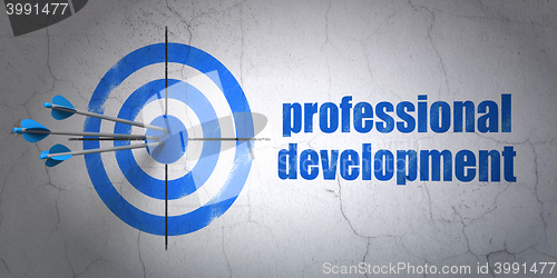 Image of Learning concept: target and Professional Development on wall background
