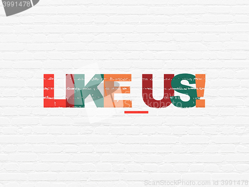 Image of Social media concept: Like us! on wall background