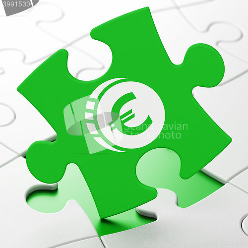 Image of Banking concept: Euro Coin on puzzle background