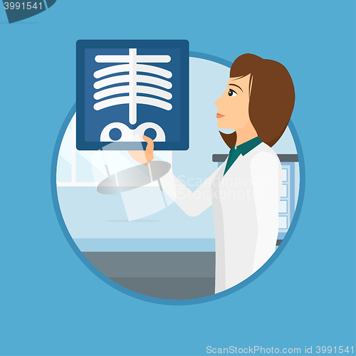 Image of Doctor examining radiograph.