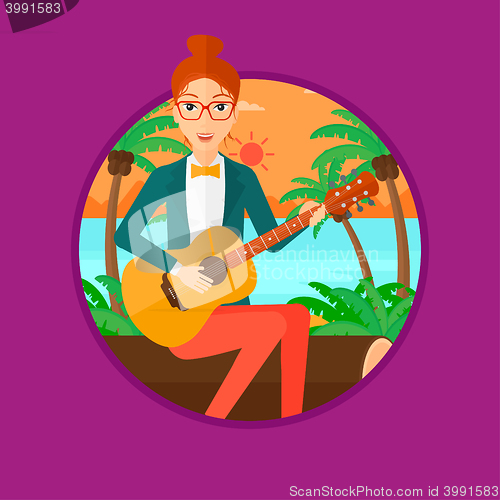 Image of Musician playing acoustic guitar.