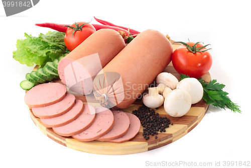 Image of sausage on plate with vegetables