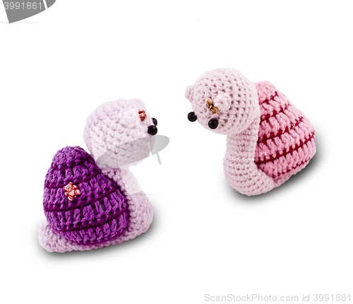 Image of knitted Garden snail in front of a white background