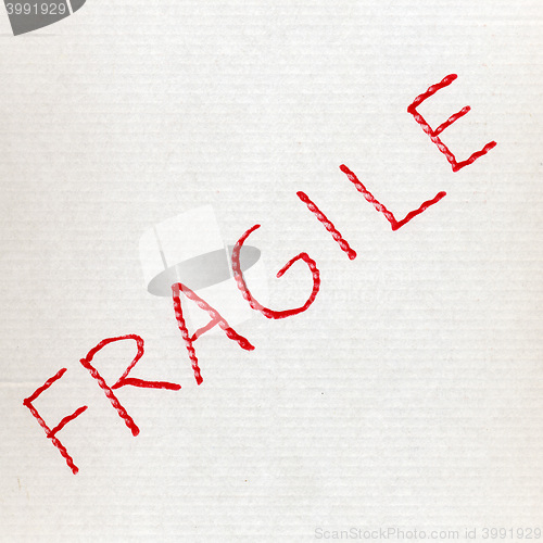 Image of White corrugated cardboard with fragile text