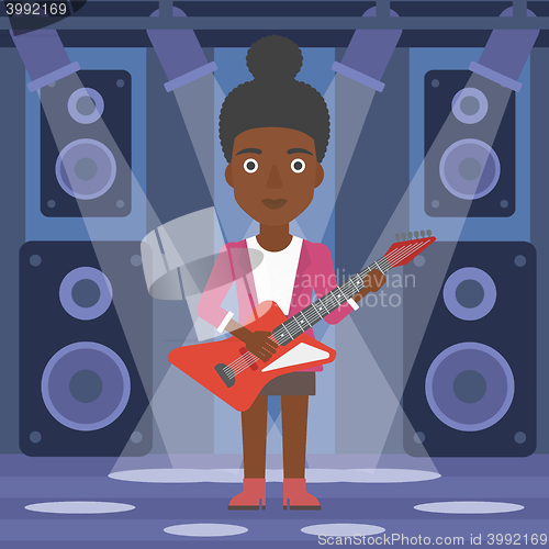 Image of Musician playing electric guitar.