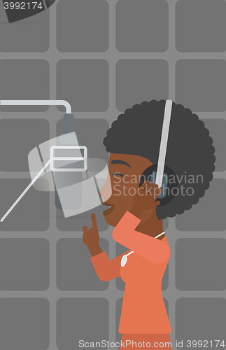 Image of Singer making record. 
