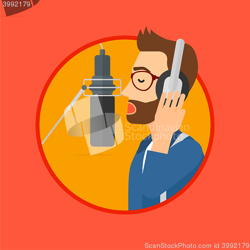 Image of Singer recording song.