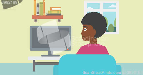 Image of Woman watching TV.