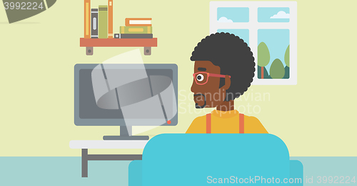 Image of Man watching TV.