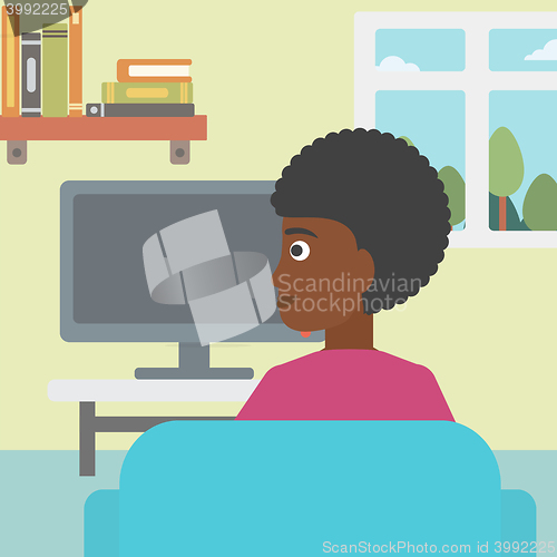 Image of Woman watching TV.
