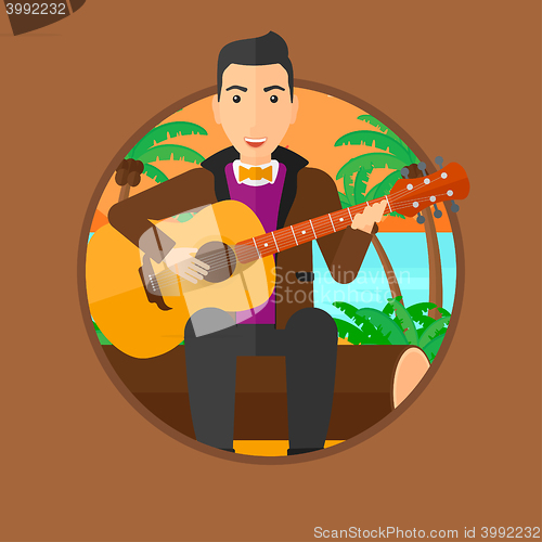 Image of Musician playing acoustic guitar.