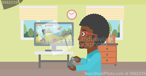 Image of Man playing video game.