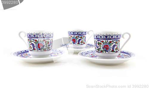 Image of Ornamented teacups isolated on white