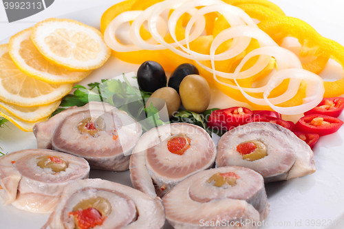Image of fish with vegetables and olives