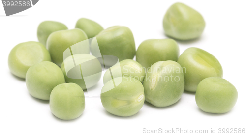 Image of green peas on white