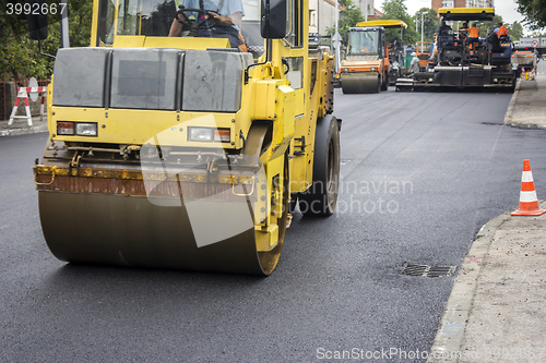 Image of Compactor roller during road construction