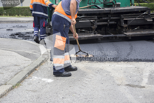 Image of Workers on Asphalting road 