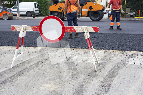 Image of Workers on Asphalting road 