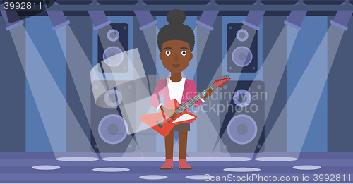 Image of Musician playing electric guitar.