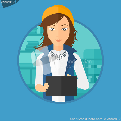 Image of Woman using tablet computer.