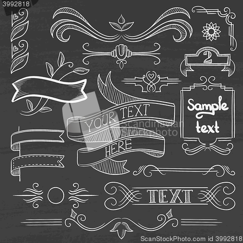 Image of Set of vintage ribbons, frames on a chalkboard.