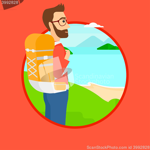 Image of Man with backpack hiking.