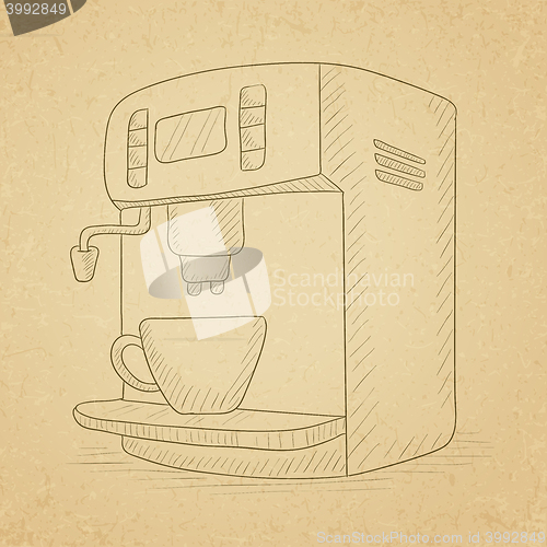 Image of Coffee maker with cup.