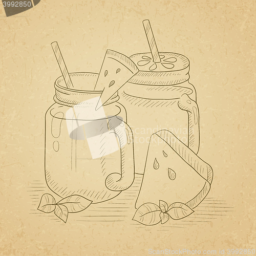 Image of Watermelon smoothie in mason jar.