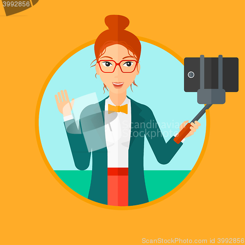Image of Woman making selfie.