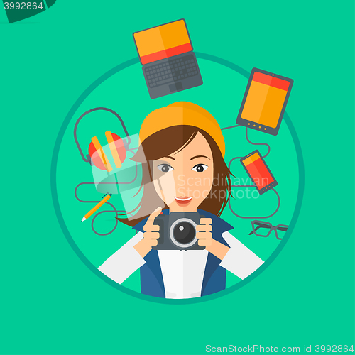 Image of Young woman surrounded with her gadgets.