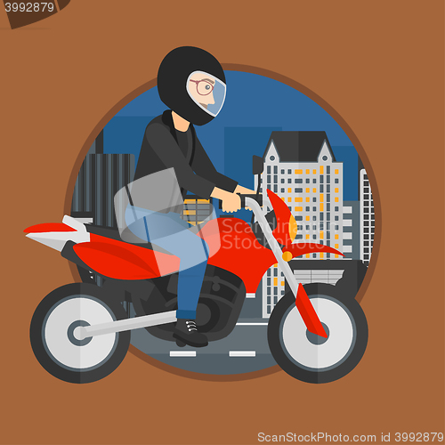 Image of Man riding motorcycle.