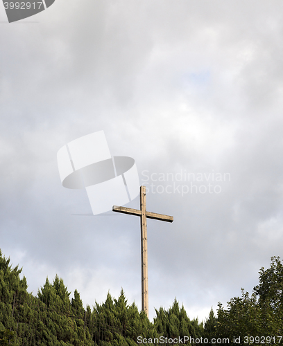 Image of wooden cross near the church