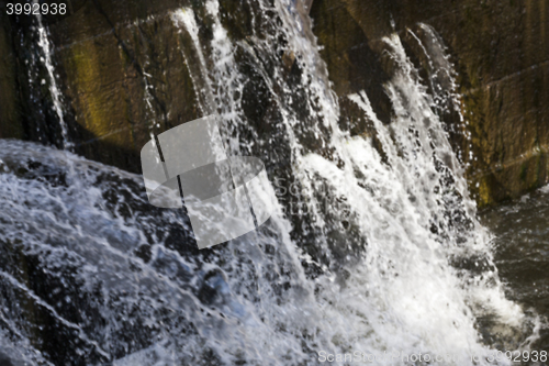 Image of old leaking dam