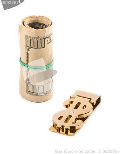 Image of Rolled up paper dollar