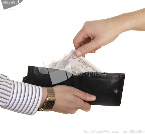 Image of man take 50 dollars from purse of his partner