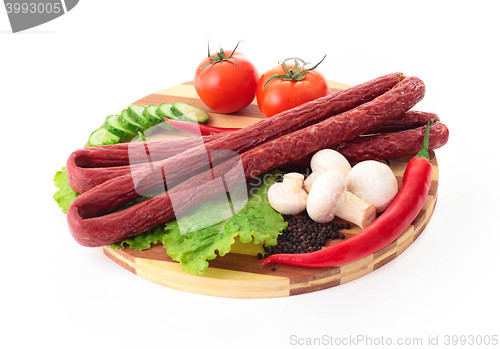 Image of sausage with salad and spices