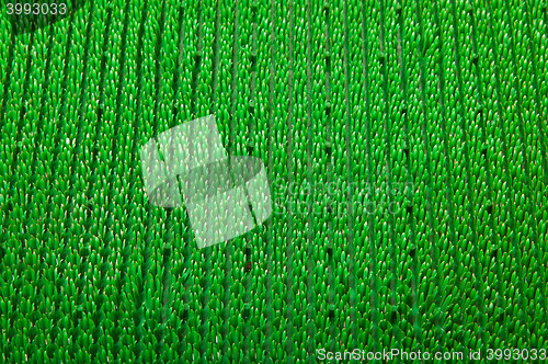 Image of green carpet close up