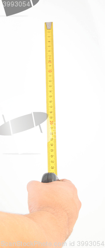 Image of hand measuring by tape measure