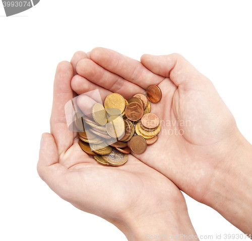 Image of Male hands holding coins isolated on white