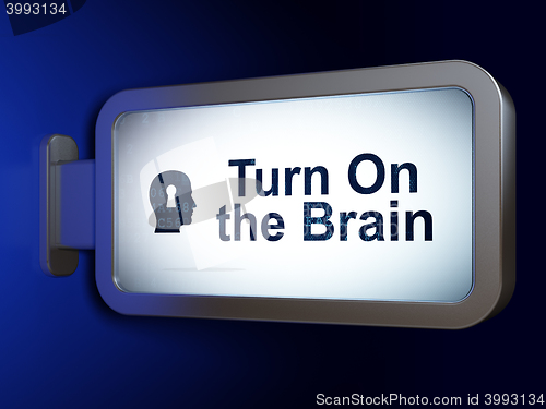 Image of Learning concept: Turn On The Brain and Head With Keyhole on billboard background