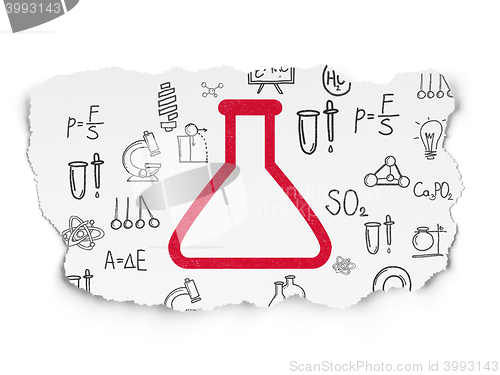 Image of Science concept: Flask on Torn Paper background