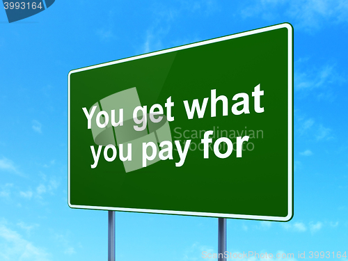 Image of Business concept: You get what You pay for on road sign background