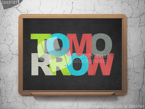 Image of Time concept: Tomorrow on School board background