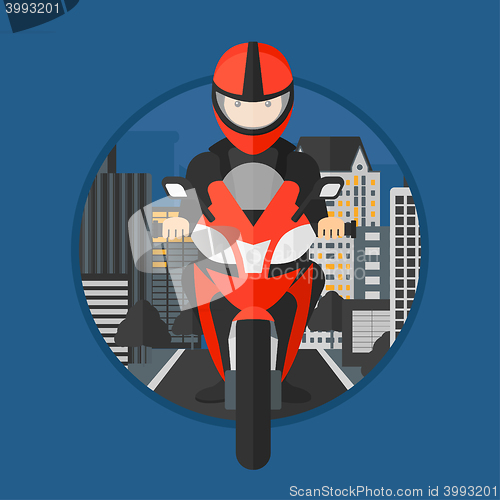 Image of Man riding motorcycle.