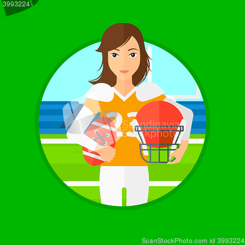 Image of Rugby player with ball and helmet in hands.