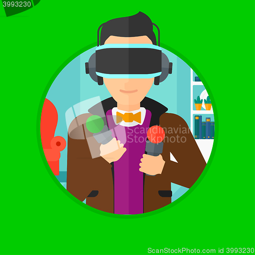 Image of Man in virtual reality headset playing video game.