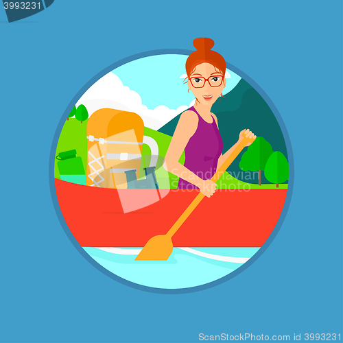 Image of Woman riding in kayak.