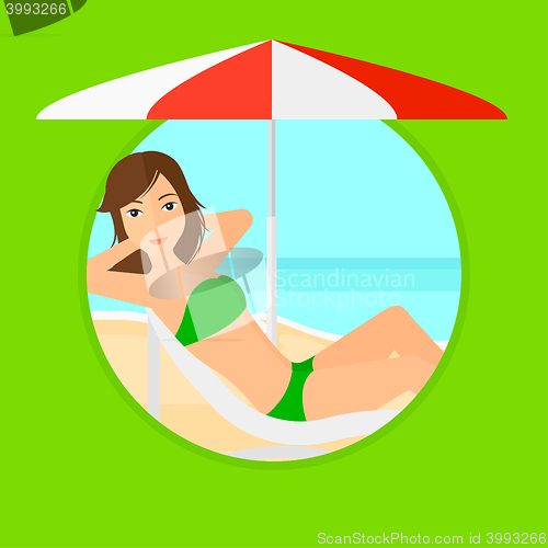 Image of Woman relaxing on beach chair.
