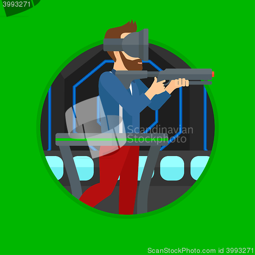 Image of Man in virtual reality headset playing video game.